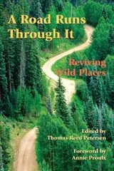 Cover of A road runs through it
